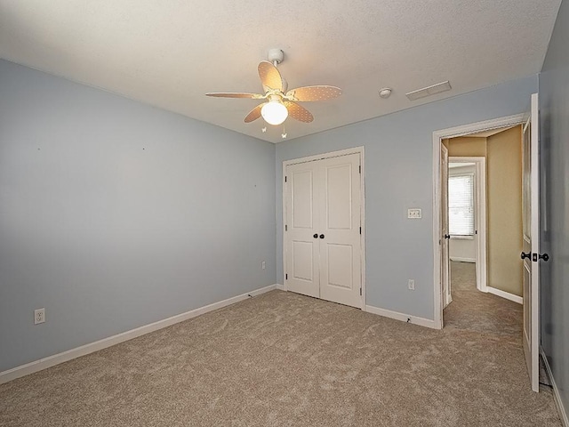 430 Longleaf Dr, Peters Twp, PA 15367 - unfurnished bedroom featuring carpet, a closet, baseboards, and ceiling fan