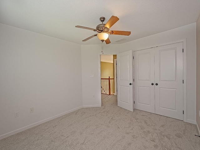 430 Longleaf Dr, Peters Twp, PA 15367 - unfurnished bedroom featuring light colored carpet, baseboards, a closet, and ceiling fan