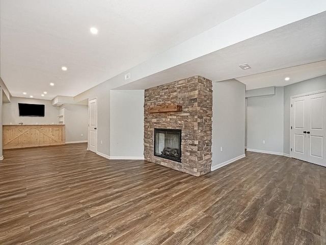 430 Longleaf Dr, Peters Twp, PA 15367 - unfurnished living room with wood finished floors, a stone fireplace, recessed lighting, and baseboards