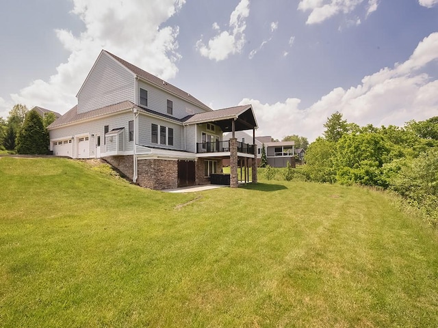 430 Longleaf Dr, Peters Twp, PA 15367 - back of property with a lawn, an attached garage, and a wooden deck