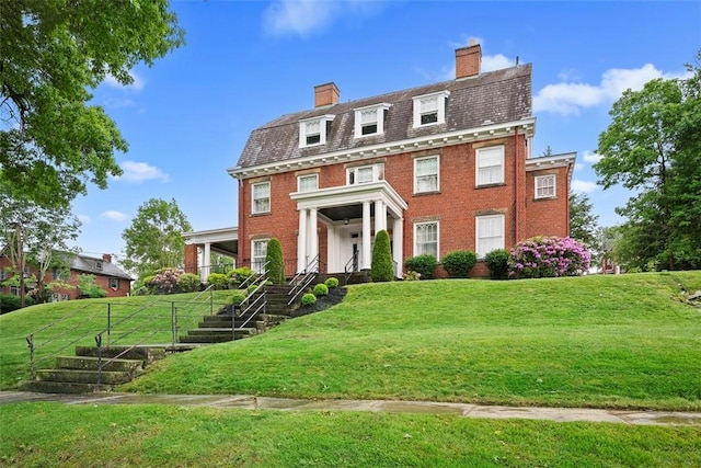 700 Meade St, Monongahela, PA 15063 - view of front of home featuring a chimney and brick siding
