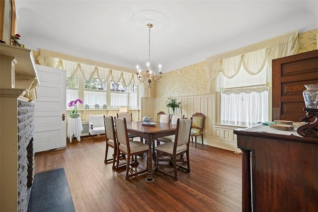 700 Meade St, Monongahela, PA 15063 - dining room featuring a chandelier, wallpapered walls, a wainscoted wall, dark wood-style floors, and a decorative wall