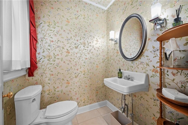 700 Meade St, Monongahela, PA 15063 - bathroom with tile patterned flooring, toilet, baseboards, wallpapered walls, and a sink