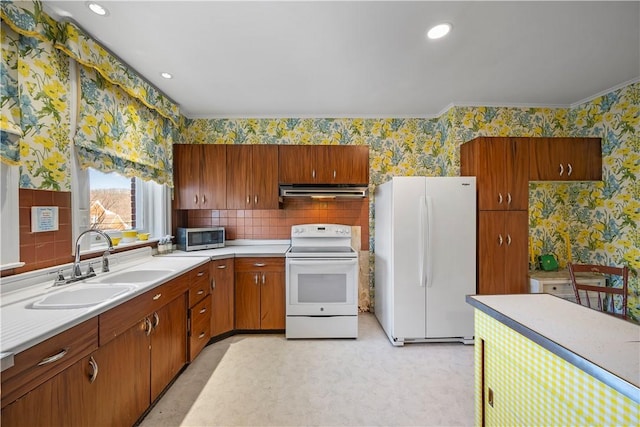 700 Meade St, Monongahela, PA 15063 - kitchen with white appliances, wallpapered walls, under cabinet range hood, light countertops, and a sink