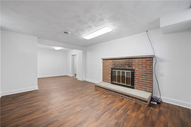 700 Meade St, Monongahela, PA 15063 - unfurnished living room featuring a fireplace, wood finished floors, and baseboards