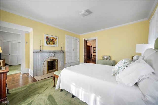 700 Meade St, Monongahela, PA 15063 - bedroom with a fireplace, ornamental molding, wood finished floors, and baseboards