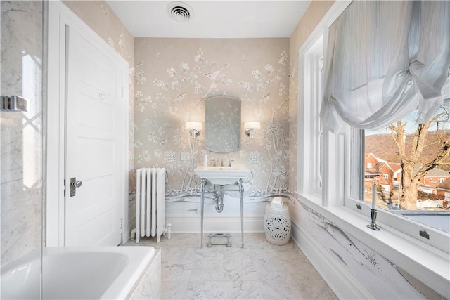 700 Meade St, Monongahela, PA 15063 - full bathroom featuring radiator, a bathtub, wallpapered walls, marble finish flooring, and baseboards
