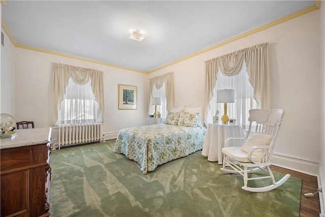 700 Meade St, Monongahela, PA 15063 - bedroom with radiator heating unit, crown molding, dark wood-type flooring, and baseboards