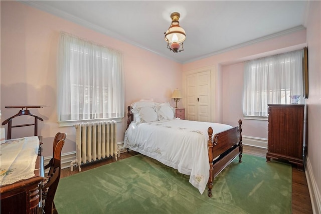 700 Meade St, Monongahela, PA 15063 - bedroom featuring radiator heating unit, wood finished floors, ornamental molding, and baseboards