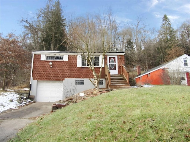 3163 Jacks Run Rd, White Oak, PA 15131 - view of front of house featuring driveway, a front yard, brick siding, and an attached garage