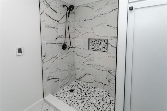 200 Centerwood Cir, South Union Twp, PA 15401 - bathroom featuring a tile shower, marble look tile flooring, and baseboards