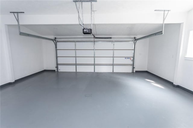 200 Centerwood Cir, South Union Twp, PA 15401 - garage featuring a garage door opener and baseboards