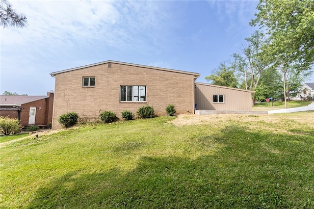 200 Centerwood Cir, South Union Twp, PA 15401 - view of home's exterior featuring brick siding and a yard