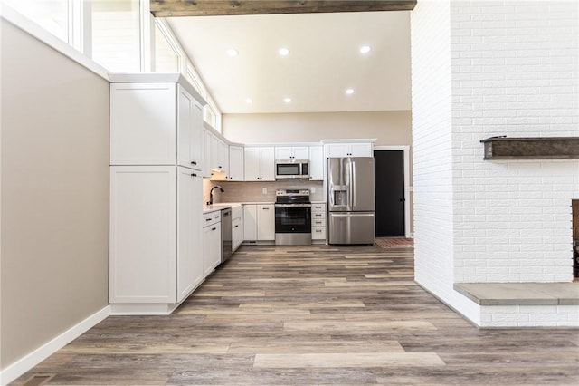 200 Centerwood Cir, South Union Twp, PA 15401 - kitchen with appliances with stainless steel finishes, white cabinetry, a sink, recessed lighting, and wood finished floors