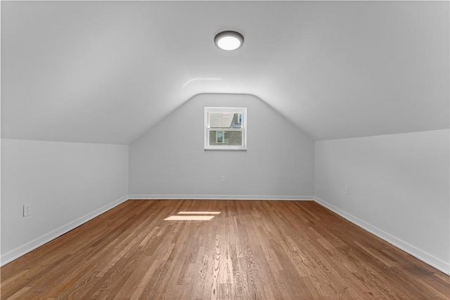 2396 Foster Rd, White Oak, PA 15131 - bonus room featuring baseboards, wood finished floors, and vaulted ceiling