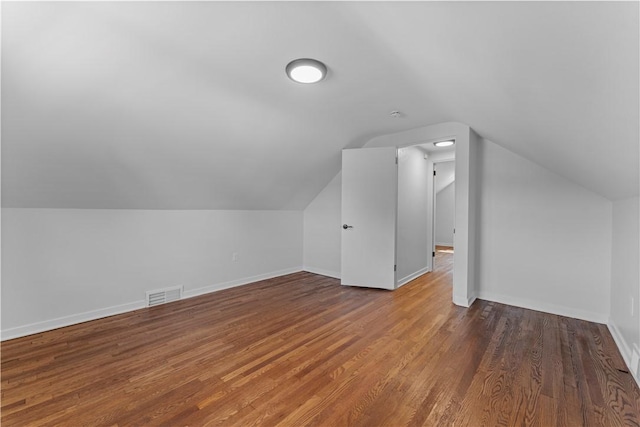 2396 Foster Rd, White Oak, PA 15131 - additional living space featuring baseboards, wood finished floors, and vaulted ceiling