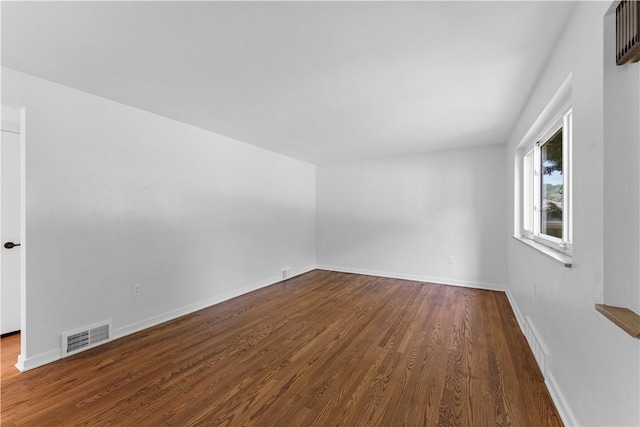 2396 Foster Rd, White Oak, PA 15131 - unfurnished room featuring dark wood-style floors and baseboards