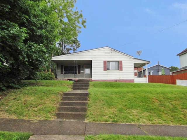 945 Roup Ave, Brackenridge, PA 15014 - bungalow-style house with a porch