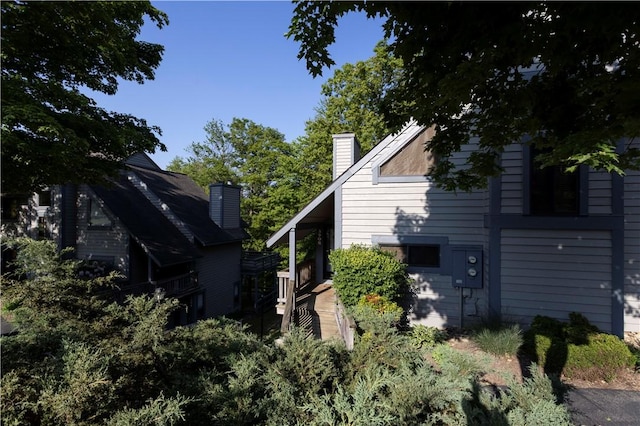 3908 Swiss Mountain Dr, Seven Springs Resort, PA 15622 - view of home's exterior featuring a chimney