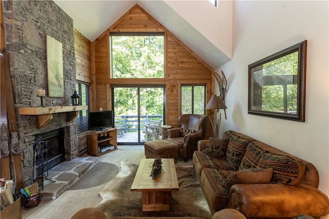 3908 Swiss Mountain Dr, Seven Springs Resort, PA 15622 - carpeted living area with healthy amount of natural light, wooden walls, high vaulted ceiling, and a stone fireplace
