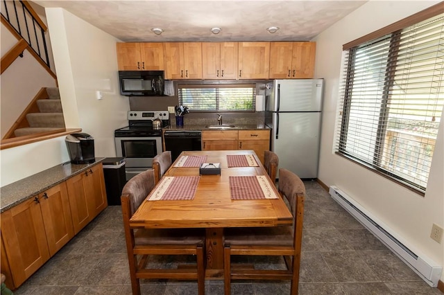 3908 Swiss Mountain Dr, Seven Springs Resort, PA 15622 - kitchen featuring black appliances, a baseboard radiator, and a sink