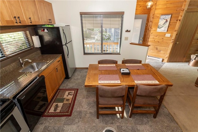 3908 Swiss Mountain Dr, Seven Springs Resort, PA 15622 - dining room featuring a baseboard heating unit and wooden walls