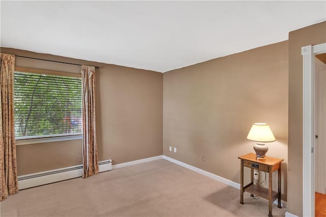 326 Pinevue Dr, Monroeville, PA 15146 - carpeted empty room featuring baseboard heating and baseboards