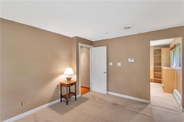 326 Pinevue Dr, Monroeville, PA 15146 - empty room featuring light colored carpet, baseboards, and baseboard heating