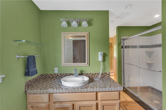 326 Pinevue Dr, Monroeville, PA 15146 - bathroom featuring a stall shower, vanity, and decorative backsplash
