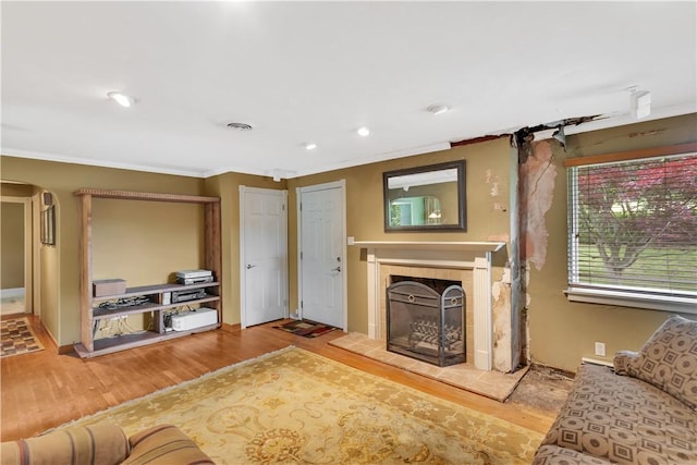 326 Pinevue Dr, Monroeville, PA 15146 - living room with a fireplace, wood finished floors, arched walkways, ornamental molding, and recessed lighting