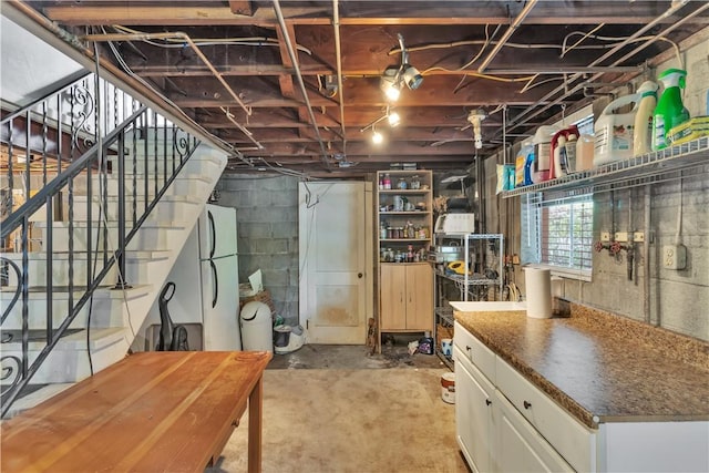 326 Pinevue Dr, Monroeville, PA 15146 - below grade area with freestanding refrigerator and stairway