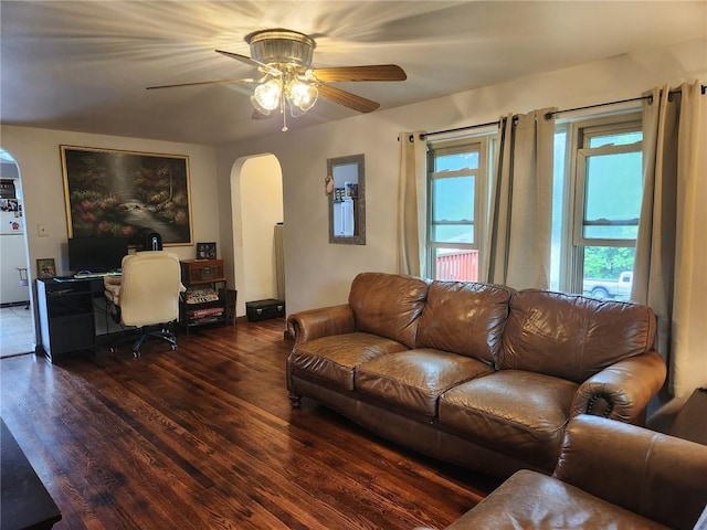 145 7th St, E Butler Boro, PA 16029 - living room with arched walkways, ceiling fan, and wood finished floors