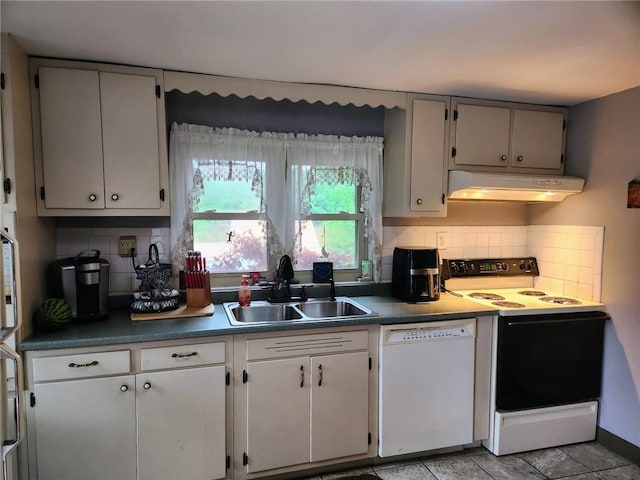145 7th St, E Butler Boro, PA 16029 - kitchen featuring white dishwasher, under cabinet range hood, electric range oven, decorative backsplash, and dark countertops