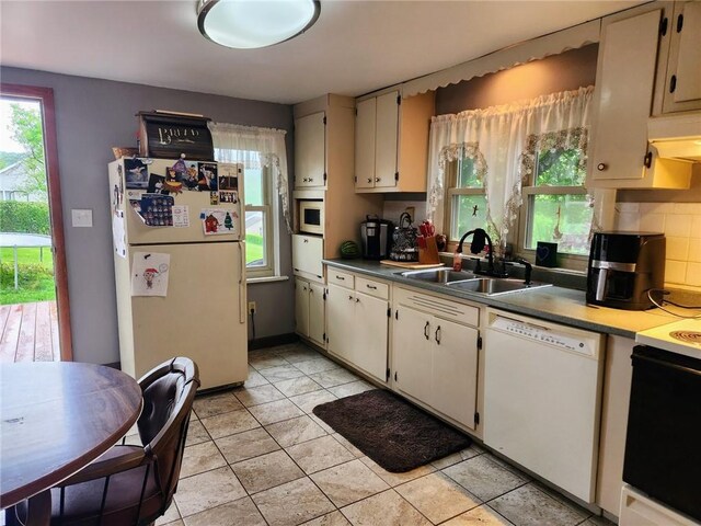 145 7th St, E Butler Boro, PA 16029 - kitchen featuring white appliances and light tile patterned floors