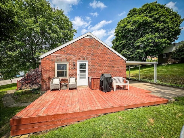 145 7th St, E Butler Boro, PA 16029 - rear view of house featuring brick siding, a wooden deck, a yard, and a carport