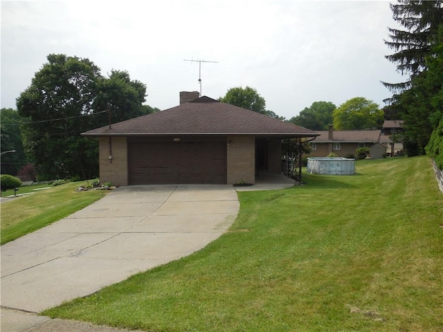 1118 Fairlane Dr, Hopewell Twp Bea, PA 15001 - view of front facade featuring concrete driveway, a front yard, brick siding, and an attached garage