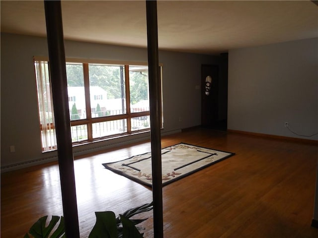 1118 Fairlane Dr, Hopewell Twp Bea, PA 15001 - living area with wood finished floors and baseboards