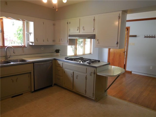 1118 Fairlane Dr, Hopewell Twp Bea, PA 15001 - kitchen featuring appliances with stainless steel finishes, a sink, ventilation hood, a baseboard heating unit, and white cabinetry