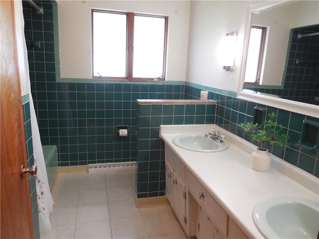 1118 Fairlane Dr, Hopewell Twp Bea, PA 15001 - bathroom with tile walls, double vanity, tile patterned flooring, bathtub / shower combination, and a wainscoted wall