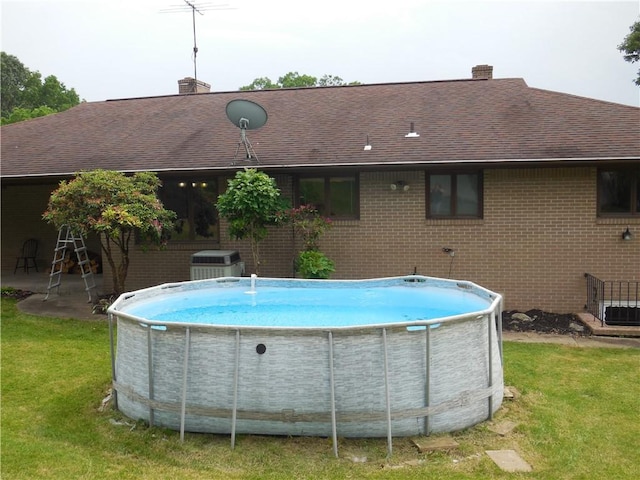 1118 Fairlane Dr, Hopewell Twp Bea, PA 15001 - swimming pool with a yard and central AC