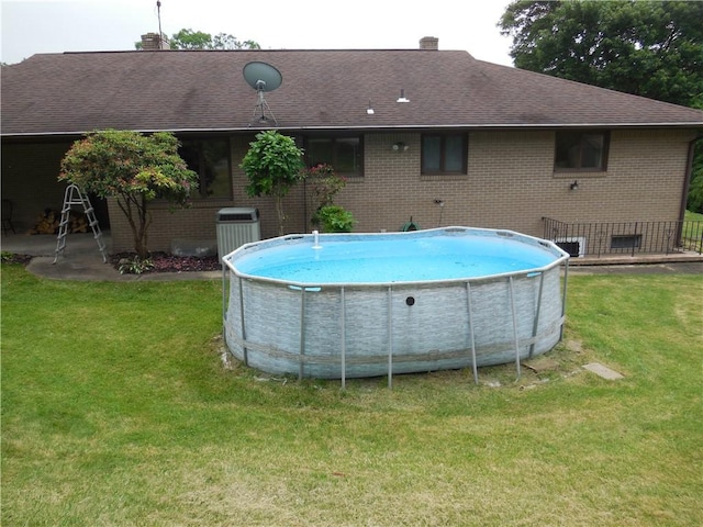 1118 Fairlane Dr, Hopewell Twp Bea, PA 15001 - swimming pool with a lawn and cooling unit