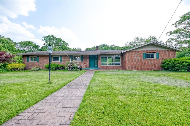 821 Chateau Dr, Franklin Twp, PA 16117 - ranch-style house with brick siding, a front lawn, and a chimney