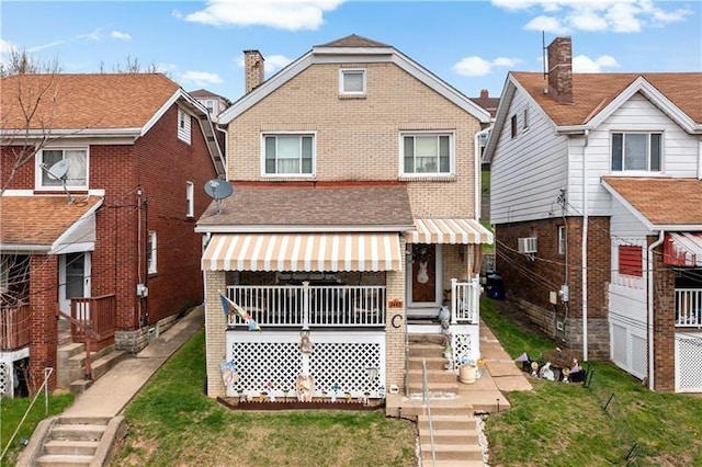 1405 Bellaire Pl, Brookline, PA 15226 - view of front of property with brick siding and a front lawn