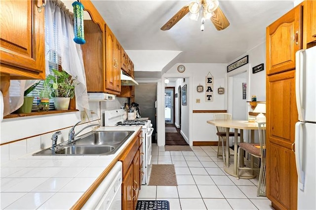 1405 Bellaire Pl, Brookline, PA 15226 - kitchen featuring white appliances, tile countertops, a sink, a ceiling fan, and brown cabinets