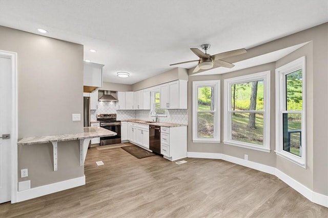14 Laurel Hill Rd, Cecil, PA 15057 - kitchen with appliances with stainless steel finishes, wall chimney range hood, a sink, baseboards, and recessed lighting