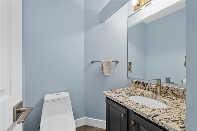 14 Laurel Hill Rd, Cecil, PA 15057 - bathroom featuring toilet, vanity, wood finished floors, and baseboards