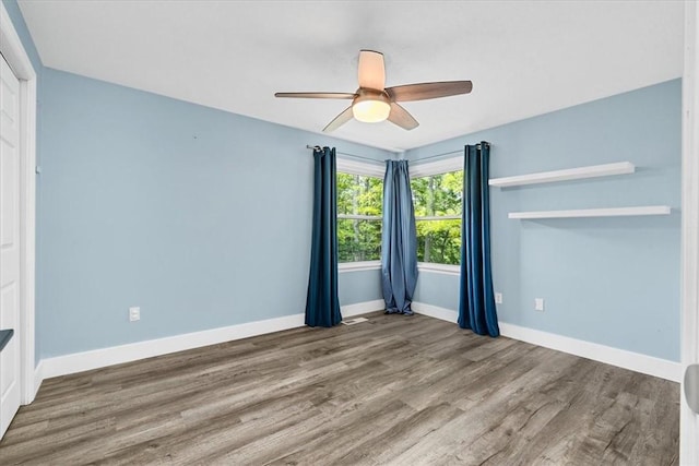 14 Laurel Hill Rd, Cecil, PA 15057 - unfurnished bedroom featuring wood finished floors, baseboards, and a ceiling fan