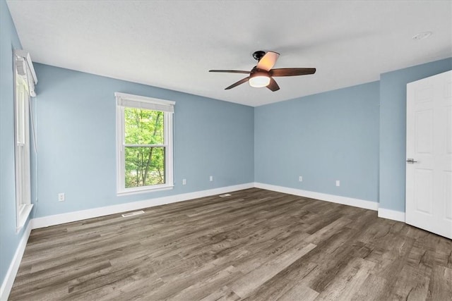 14 Laurel Hill Rd, Cecil, PA 15057 - empty room with wood finished floors, ceiling fan, and baseboards