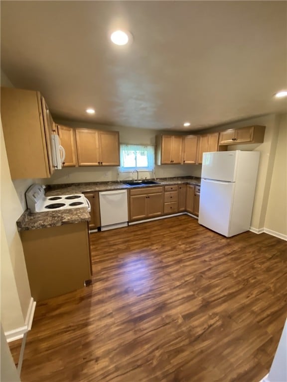 553-555 Steel Ave, Hempfield Twp Wml, PA 15635 - kitchen featuring white appliances, a sink, dark wood-style floors, dark countertops, and recessed lighting
