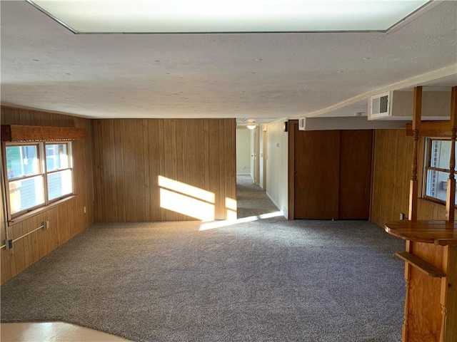 1464 State Route 819, Salem Twp Wml, PA 15601 - carpeted empty room featuring wooden walls and a textured ceiling
